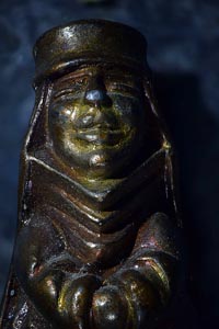 Small figurine with reversed Pentax 67-165 mm lens at f/8 with Zerene Stacker DMap stack of 50 images